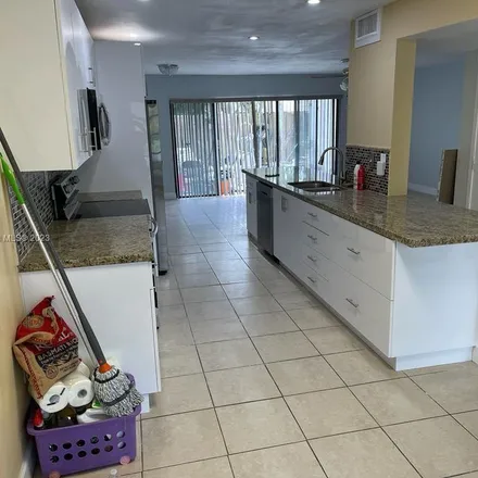 Rent this 4 bed apartment on 3356 Atlanta Street in Hollywood, FL 33021