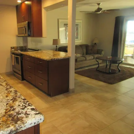 Rent this 1 bed condo on 7430 E Chaparral Rd 125B