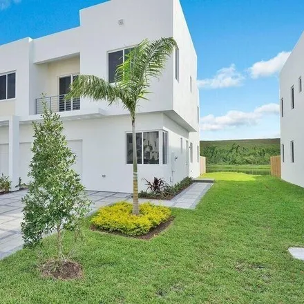 Rent this 4 bed townhouse on 7241 Northwest 102nd Place in Doral, FL 33178