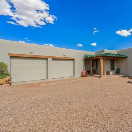 Buy this 4 bed house on 85 Avenida Frijoles in Santa Fe County, NM 87507