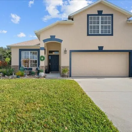 Buy this 3 bed house on 328 Breakaway Trail in Titusville, FL 32780