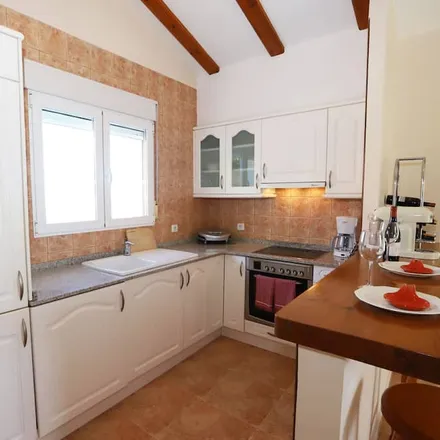 Rent this 3 bed house on 03750 Pedreguer