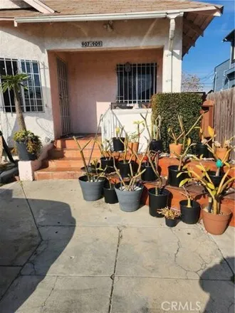 Buy this 4 bed house on 897 East 50th Street in Los Angeles, CA 90011