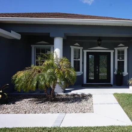 Buy this 4 bed house on 1029 Southeast Bywood Avenue in Port Saint Lucie, FL 34983