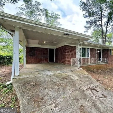 Buy this 3 bed house on 2322 Cranbrooke Drive in Candler-McAfee, GA 30032