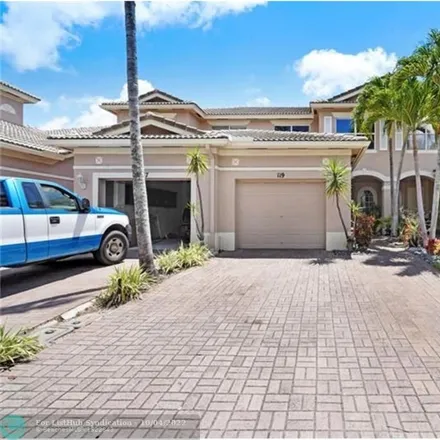 Rent this 2 bed townhouse on 119 Coconut Key Lane in Delray Beach, FL 33484