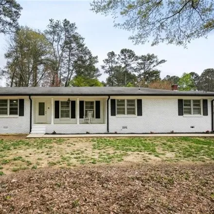 Buy this 3 bed house on 1901 Powder Springs Road Southwest in Cobb County, GA 30064