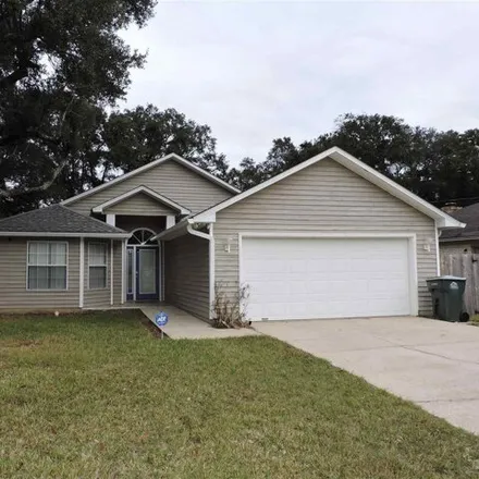 Rent this 3 bed house on 3152 Raines Court in Ferry Pass, FL 32514