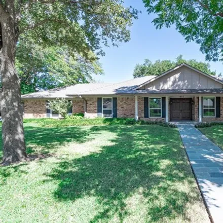 Rent this 4 bed house on 1815 North Crest Drive in Carrollton, TX 75006