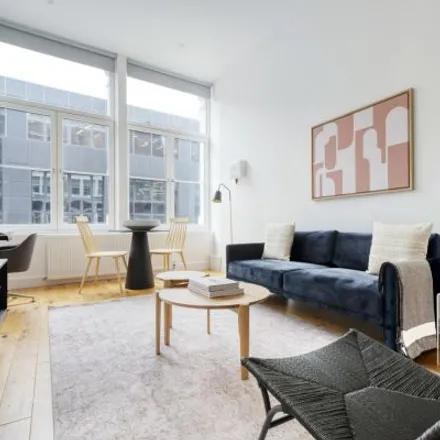 Rent this 2 bed apartment on Papa John's in 65 Farringdon Road, London