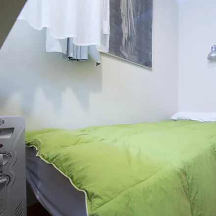 Rent this 6 bed room on Calle de la Bahía in 39, 28008 Madrid