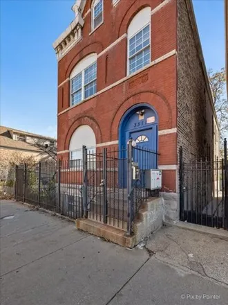 Buy this 9 bed house on 3311 West Cermak Road in Chicago, IL 60623