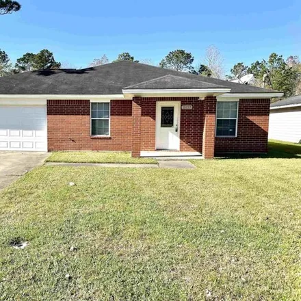 Rent this 4 bed house on 8055 Park North Dr in Beaumont, Texas