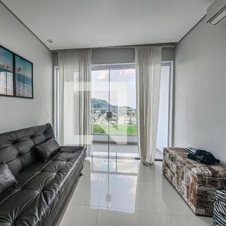 Rent this 3 bed apartment on Rua Silvio Daige in Jardim Vitória, Guarujá - SP