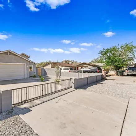 Buy this 3 bed house on 2471 West Tonto Street in Phoenix, AZ 85009