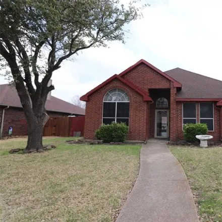 Rent this 3 bed house on 2626 Daisy Lane in Rowlett, TX 75089
