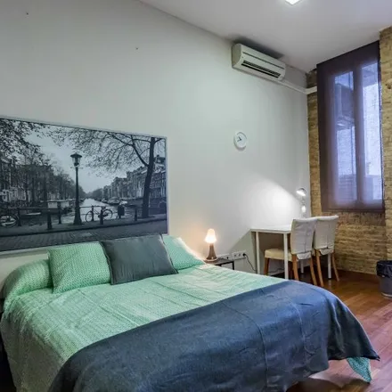 Rent this 7 bed room on Carrer dels Adressadors in 46001 Valencia, Spain