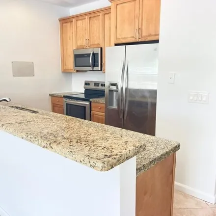 Rent this 3 bed house on 2299 Washington Street in Hollywood, FL 33020