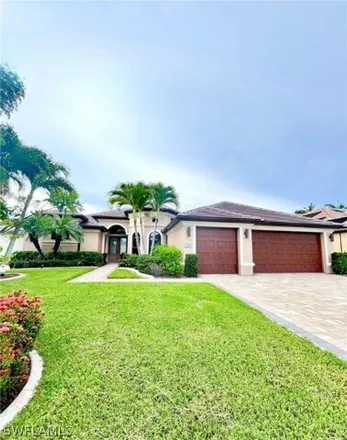 Rent this 4 bed house on 1921 SW 54th St in Cape Coral, Florida