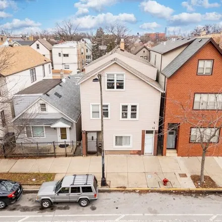 Buy this 7 bed house on 1635 North Kedzie Avenue in Chicago, IL 60647