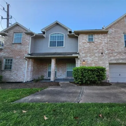 Rent this 3 bed house on 1098 Enclave Square North in Houston, TX 77077