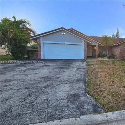 Buy this 4 bed house on 364 Nw 107th Ter in Coral Springs, Florida