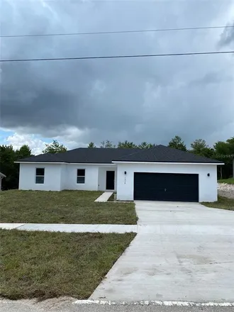 Buy this 4 bed house on 1558 April Avenue in Deltona, FL 32725