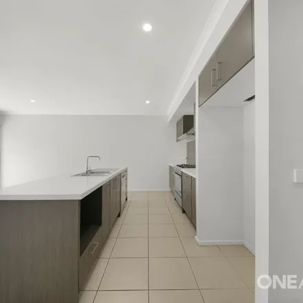 Rent this 4 bed apartment on Myrtleleaf Street in Tarneit VIC 3029, Australia