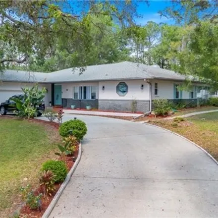 Buy this 4 bed house on Byrsonima Court in Citrus County, FL