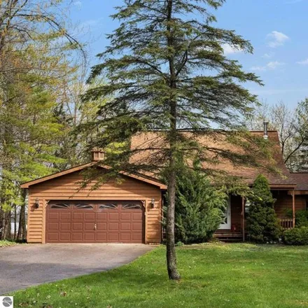 Buy this 3 bed house on 7784 North Shore Court in Green Lake Township, Grand Traverse County