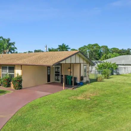 Buy this 2 bed house on 501 Northwest Haven Street in Port Saint Lucie, FL 34983