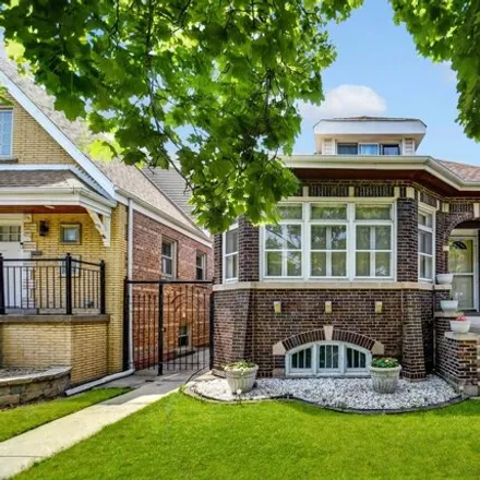 Buy this 4 bed house on 3937 W 61st Pl in Chicago, Illinois