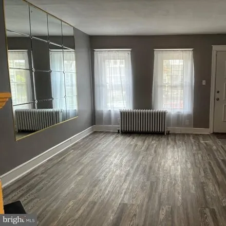 Rent this 3 bed house on 721 West Fisher Avenue in Philadelphia, PA 19141