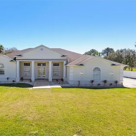 Buy this 4 bed house on 6650 Country Club Road in Pasco County, FL 33544
