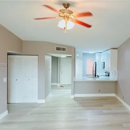Rent this 3 bed condo on 9845 Three Lakes Circle in Palm Beach County, FL 33428
