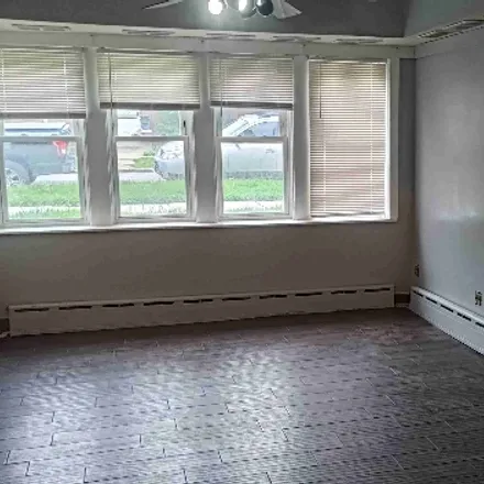 Rent this 3 bed apartment on 4708 W Grace St