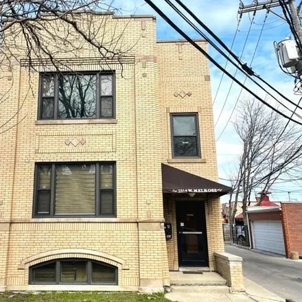 Rent this 3 bed house on 5614 West Melrose Street in Chicago, IL 60634