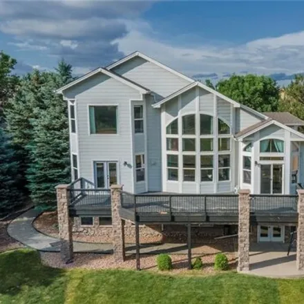 Buy this 6 bed house on 11076 W Rockland Dr in Littleton, Colorado