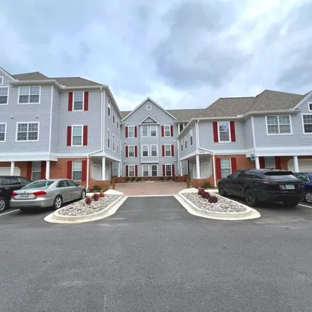Rent this 2 bed condo on 5000 Hollington Drive in Owings Mills, MD 21117