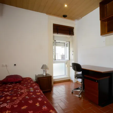 Rent this 11 bed room on Rua Tomás Borba 20 in 1000-197 Lisbon, Portugal