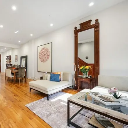 Buy this 5 bed townhouse on 261 West 132nd Street in New York, NY 10027