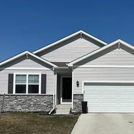 Rent this 4 bed house on 1055 Waukee Avenue