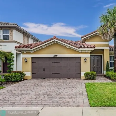 Buy this 3 bed house on 10331 Lake Vista Ct in Parkland, Florida