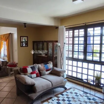 Buy this 3 bed house on Rua Itaboraí in Jardim Botânico, Porto Alegre - RS