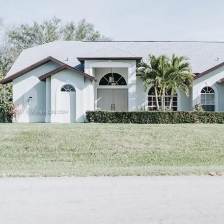Buy this 3 bed house on 610 Robert Avenue in Lehigh Acres, FL 33936
