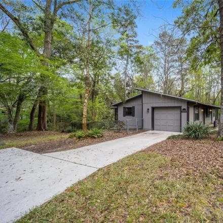 Buy this 3 bed house on 3009 Nw 39th Pl in Gainesville, Florida