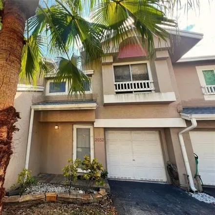 Rent this 2 bed townhouse on Discovery Circle East in Deerfield Beach, FL 33442