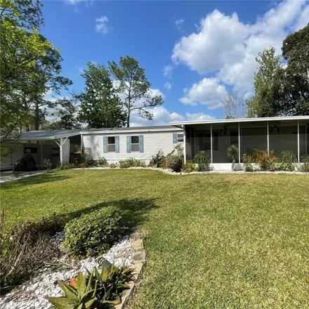 Buy this studio apartment on 23901 Alley Cat Road in Lake County, FL 32102