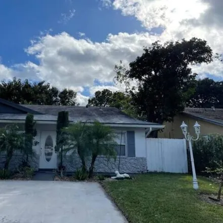 Buy this 2 bed house on 3838 Kenas Street in North Palm Beach, FL 33403