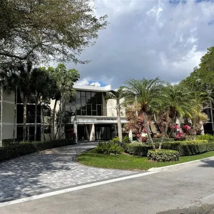 Rent this 1 bed condo on 16500 Golf Club Rd Apt 108 in Weston, Florida